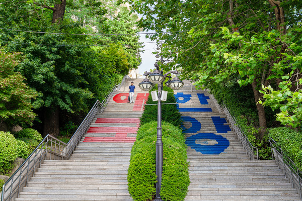Students walking up and down the 88 Steps.